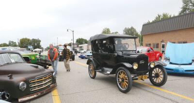  Ron Fuller, a 1983 Roseville High School graduate, arrives at Jammin’ at the Junction with his 1924 Ford Model T with cutouts of the comedy duo Stan Laurel and Oliver Hardy “seated” in the rear. 