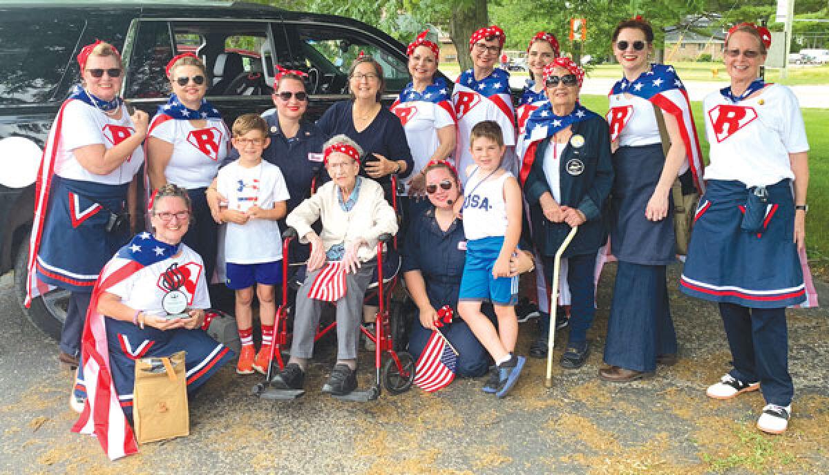  Dressed as Rosie super heroes, the Eastern Michigan Women Ordnance Workers chapter of the American Rosie the Riveter Association marched at the Bay-Rama Fishfly Festival parade in New Baltimore in 2021. The families of two Rosies were in the parade. 