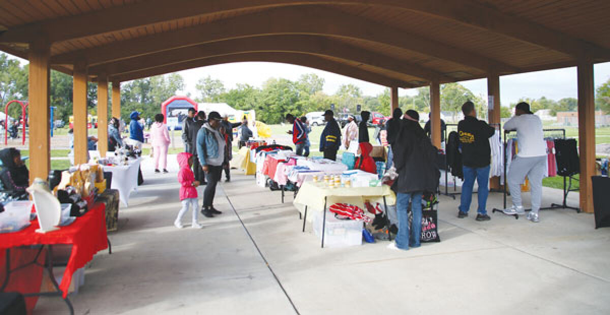  Shoppers visit vendors in Pavilion 1 at Prince Drewry Park on Sept. 28, the first day of the Market Days event series.  