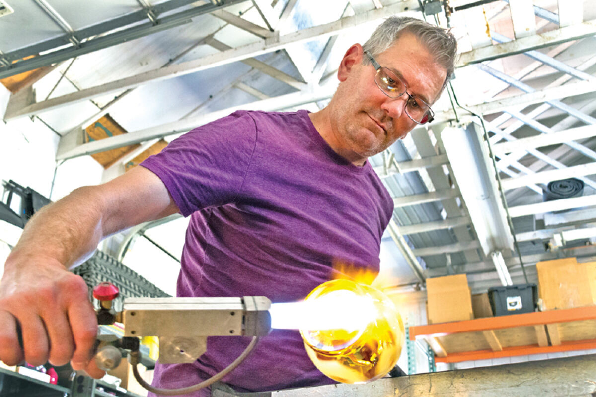  Scott Bayless said he enjoys creating pretty flowers out of glass. 