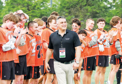 Ben Waechter runs to his team after scoring the game-winning goal in overtime. 