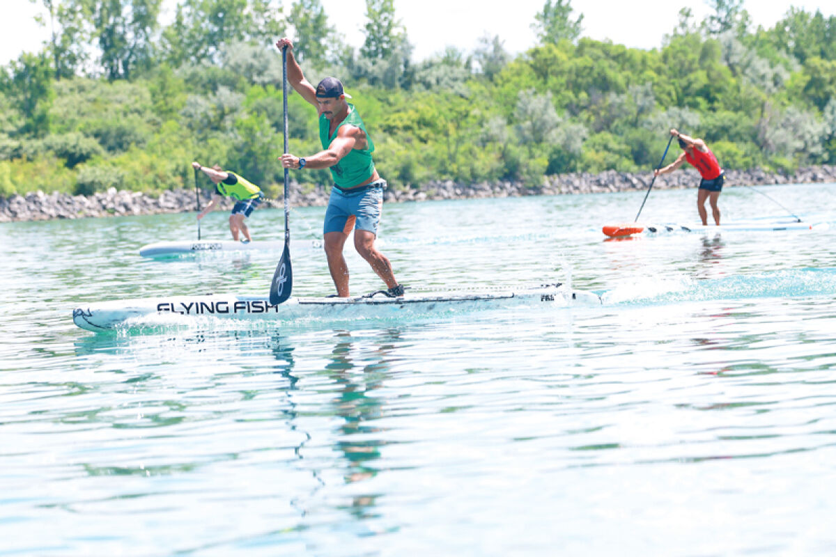  Jake Portwood finishes in first place in his event at the Paddleboard National Championships held July 18 at the Wyandotte Boat Club. 