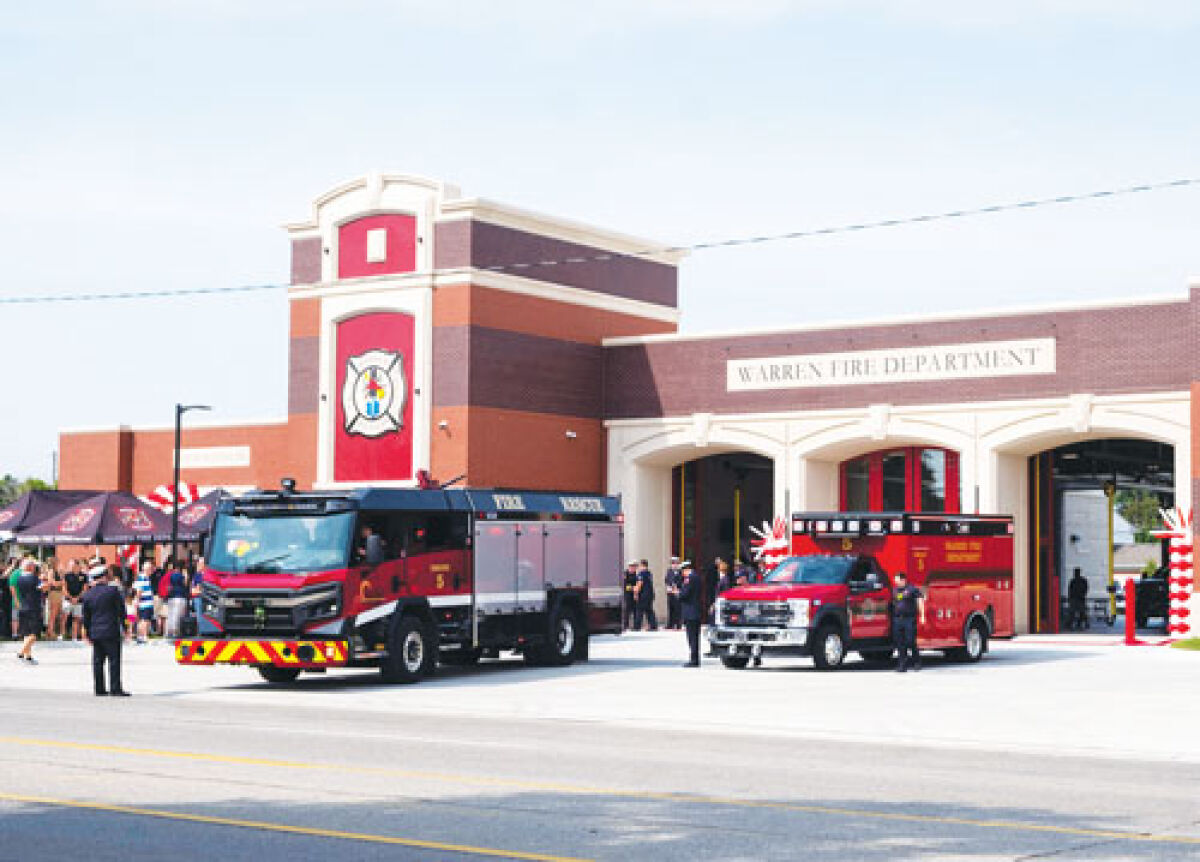  Warren Fire Department vehicles are parked outside of the new Fire Station No. 5 during a dedication ceremony July 30. 