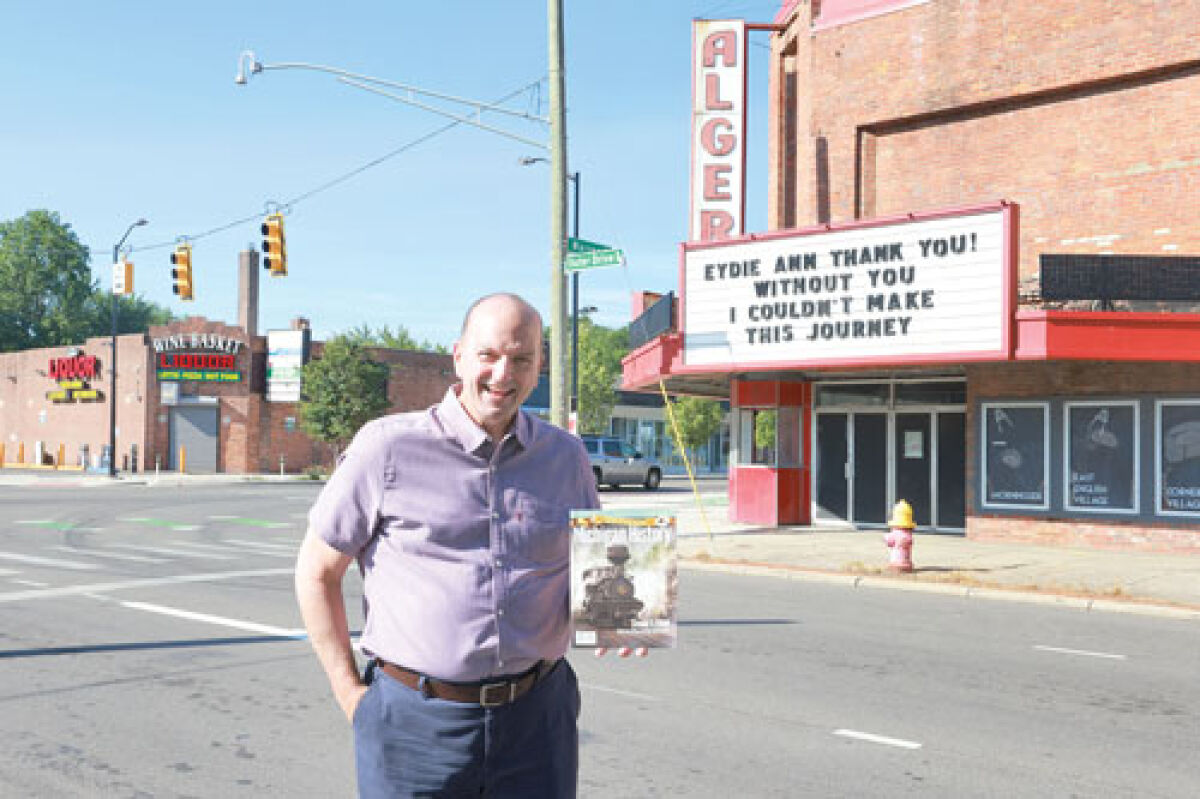  Retired Warren Consolidated Schools Superintendent Robert Livernois, standing in front of the Alger Theatre on Detroit’s east side, talks about the city’s history on his podcast “Hidden in Plain Sight.” 