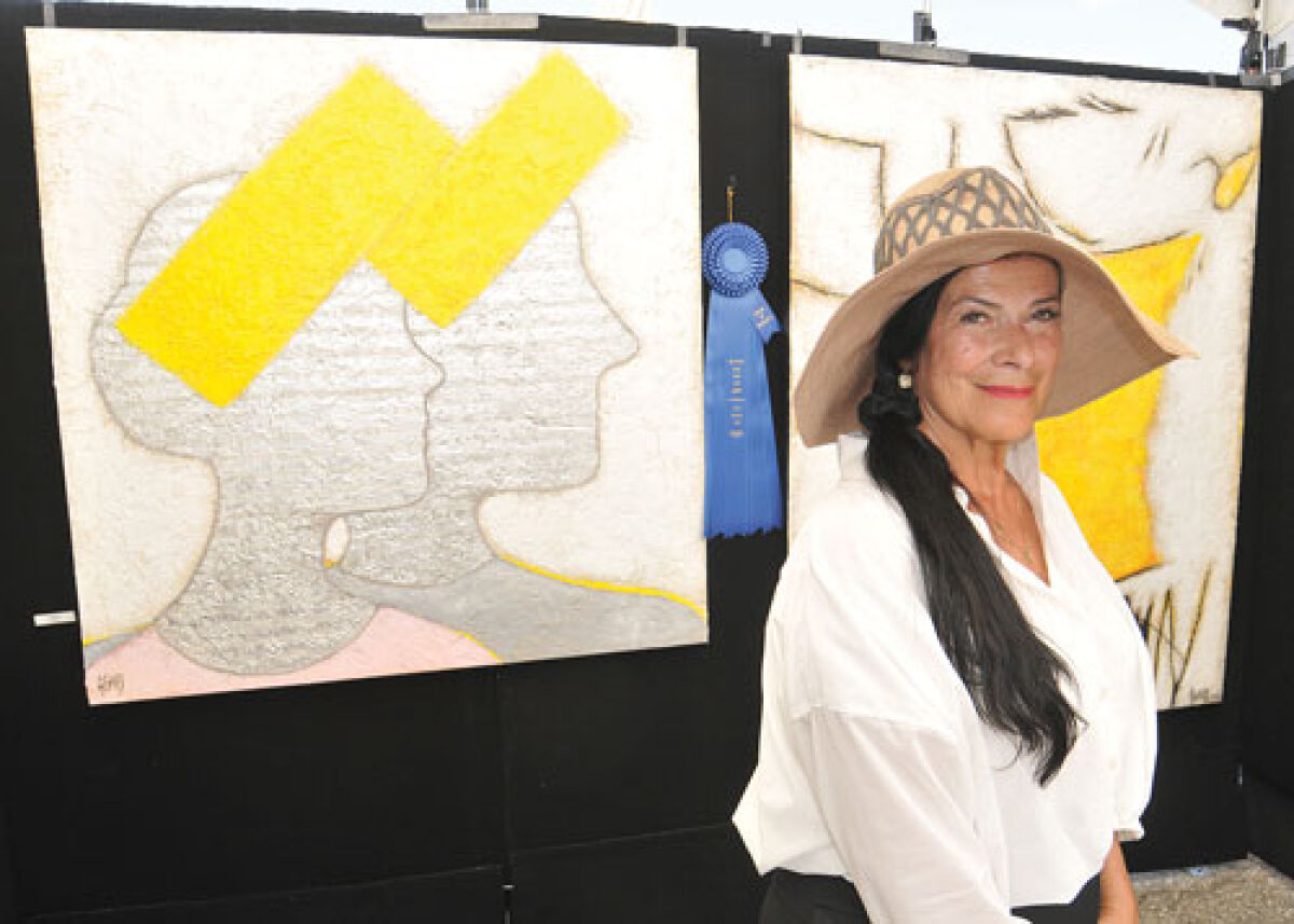  Agnes Rathonyi was the featured artist at the 22nd Orchard Lake Fine Art Show in West Bloomfield July 26-27. She created an entirely new collection for this year’s show.  