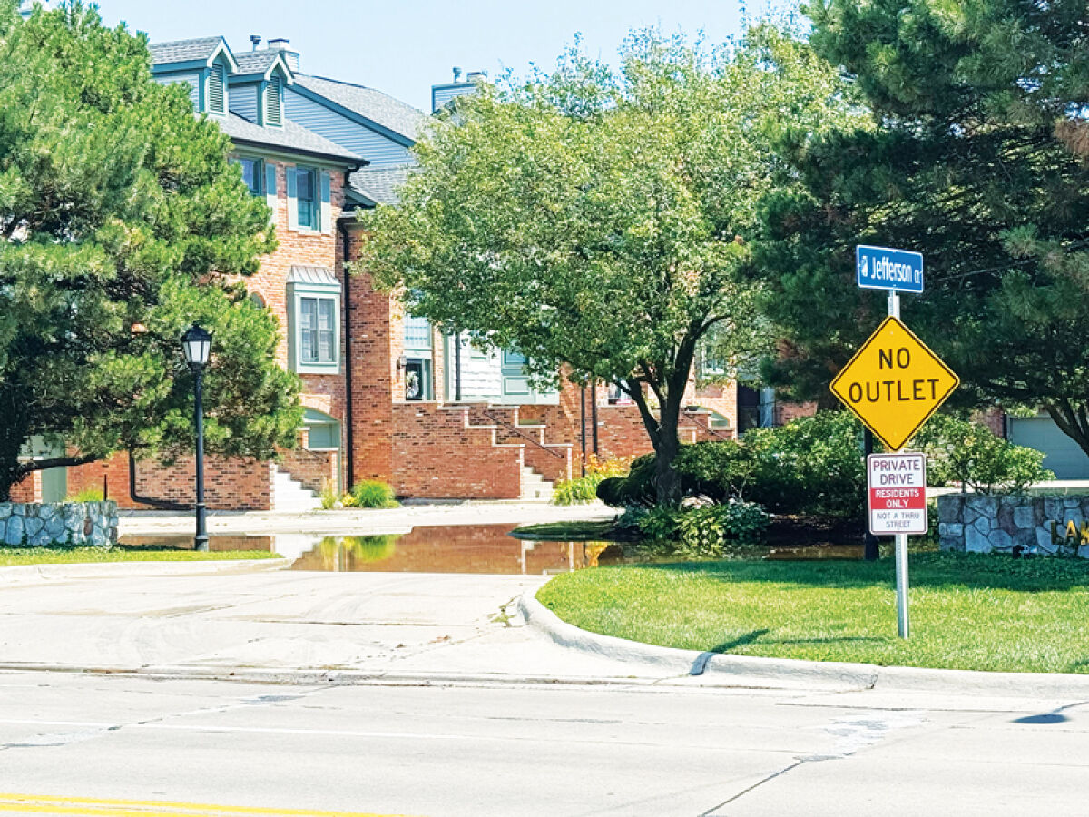  All around St. Clair Shores, residents cleaned up their houses and city workers repaired streets and drains after a flash flood on July 28. 