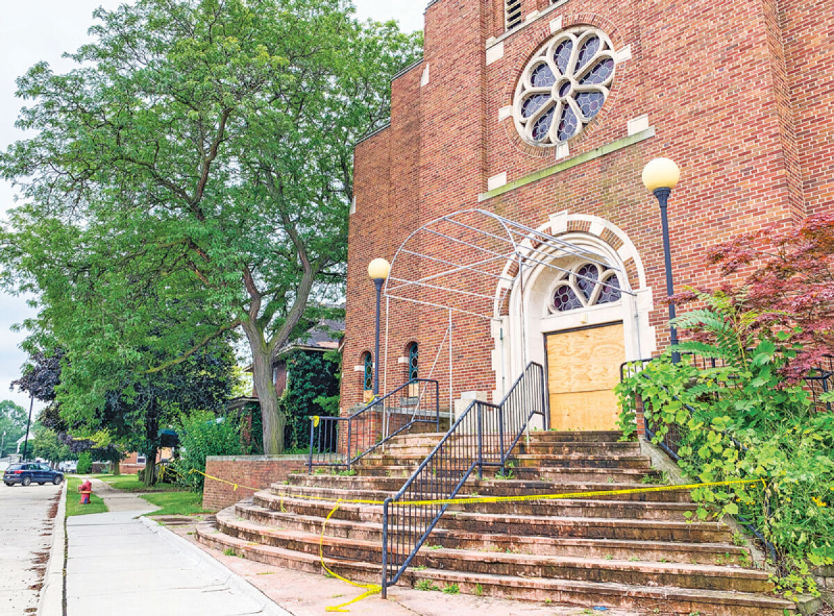  The entry doors containing stained glass at the former Catholic Community of Sacred Heart Church are being saved and repurposed. Demolition has begun on the building in Roseville, despite repeated attempts to save it. 