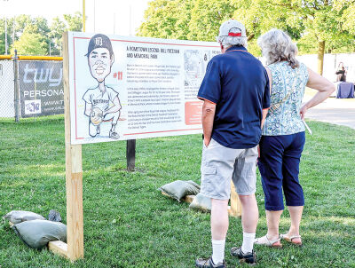  Fans read Memorial Park’s Bill Freehan billboard on July 22. 