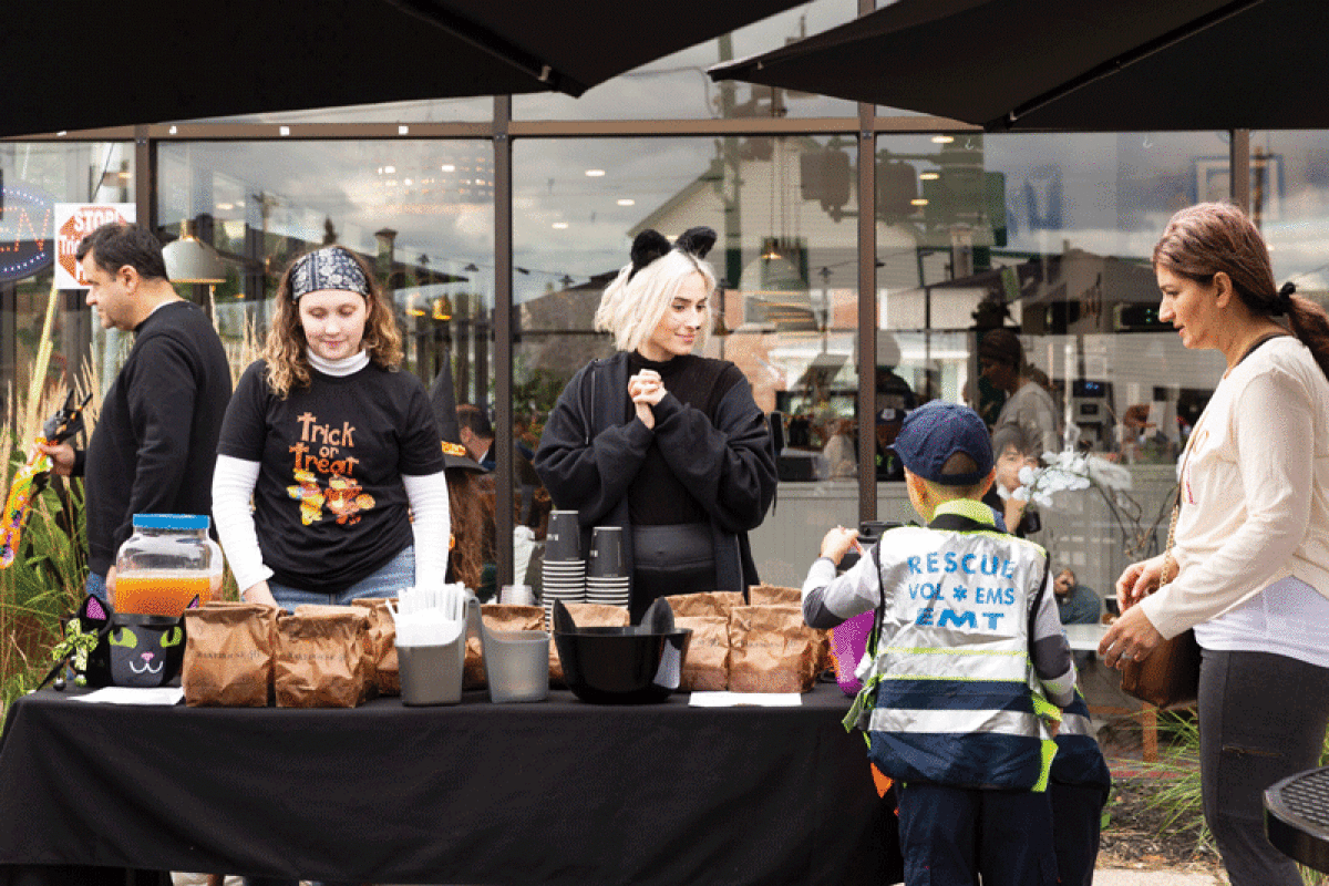  Bakehouse 46 hands out treats during a previous  Trick-or-Treat Downtown event. 