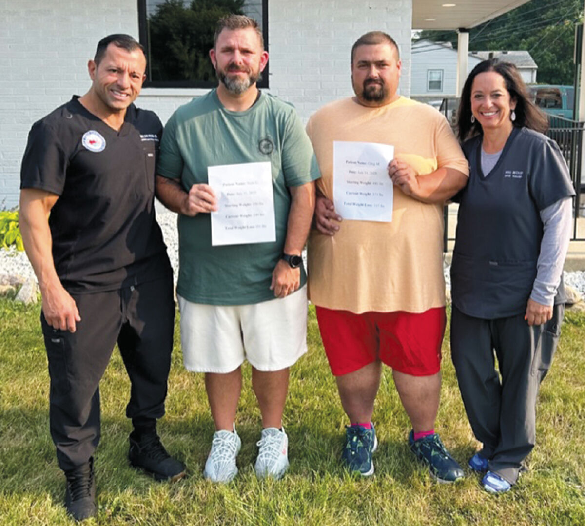  Dr. Awada and Nina B. stand with Nick G. and Greg M. after their weight loss. 