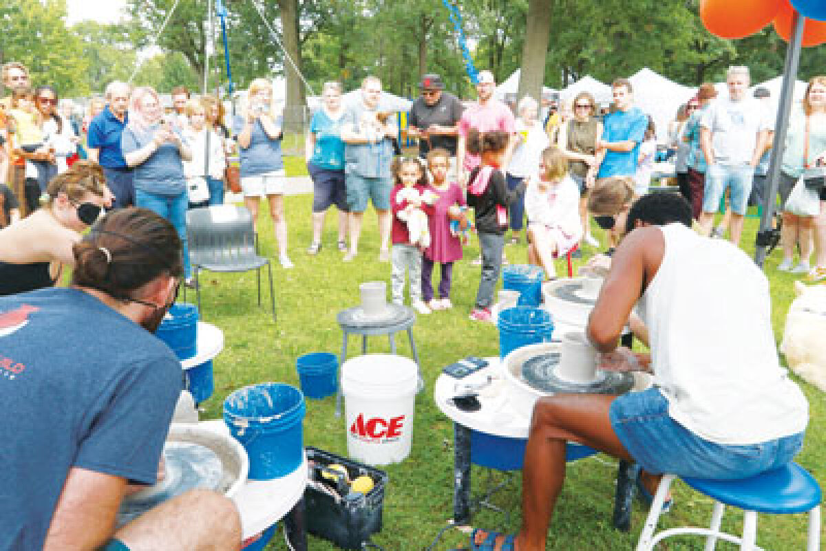  This year’s Hazel Park Art Fair will feature the return of sculptors from  the Clawson Clay Guild, seen here at the 2023 event. Attendees will be able  to participate in a series of clay-related contests. 