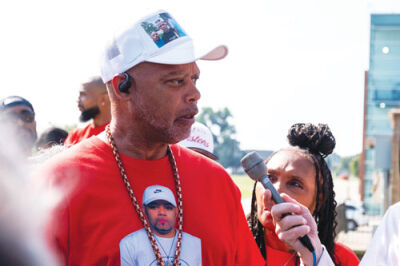  Cedric Hayden, father of Cedric Hayden Jr., is surrounded by relatives and members of the media as he delivers remarks following James Burke’s exam hearing.  