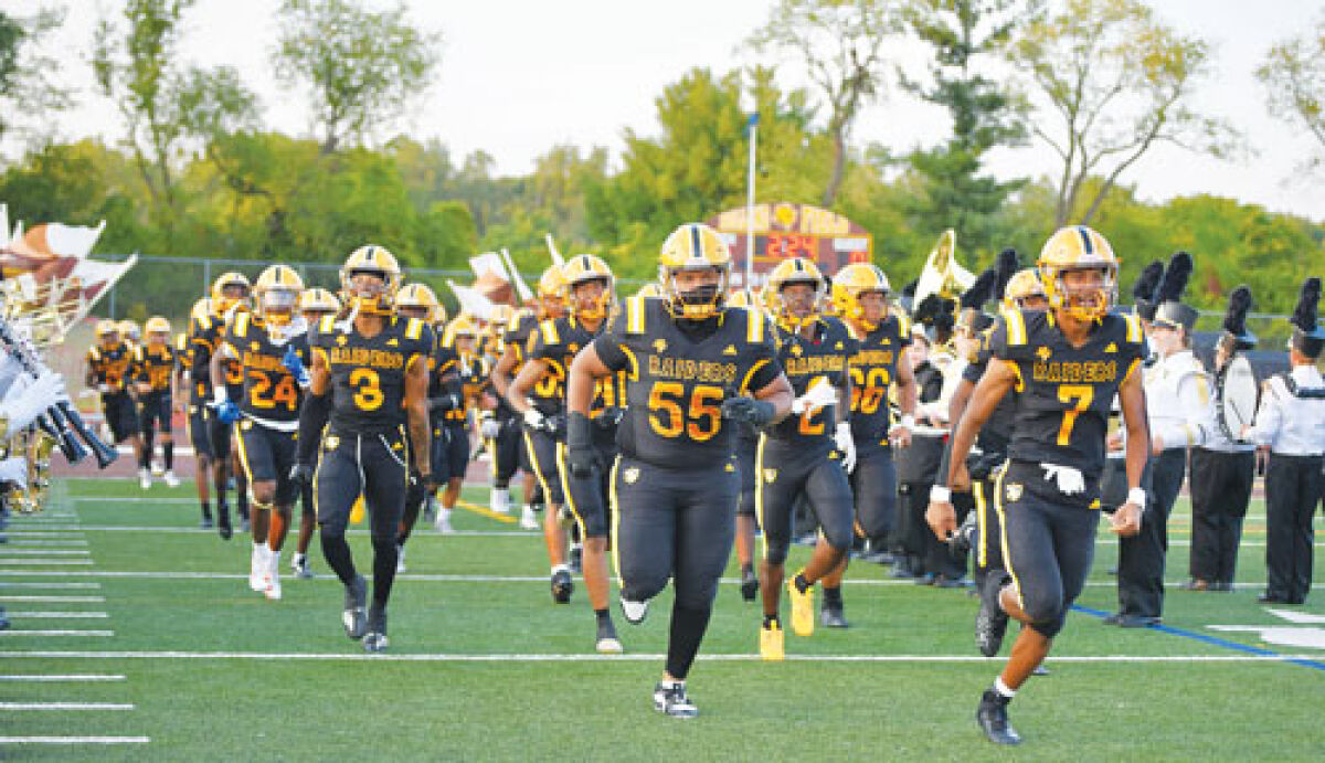  North Farmington takes the field against rival Farmington in 2024. 