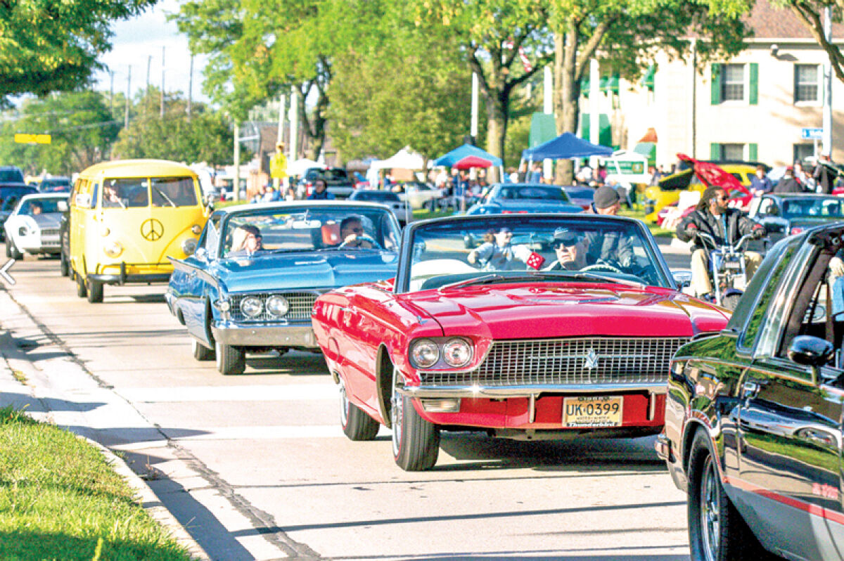  Classic vehicles cruise Harper Avenue in August 2023. Over the years, the Shorewood Kiwanis has collected thousands of dollars from the Harper Charity Cruise to help with the community projects, though the exact amount varies from year to year. 