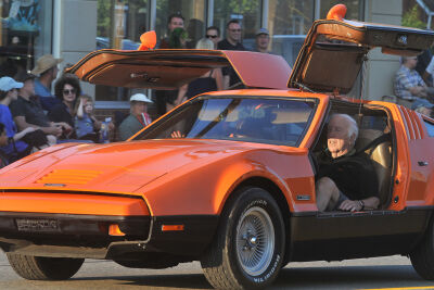  Spectators enjoy seeing the gull-wing doors of the Bricklin SV-1. 