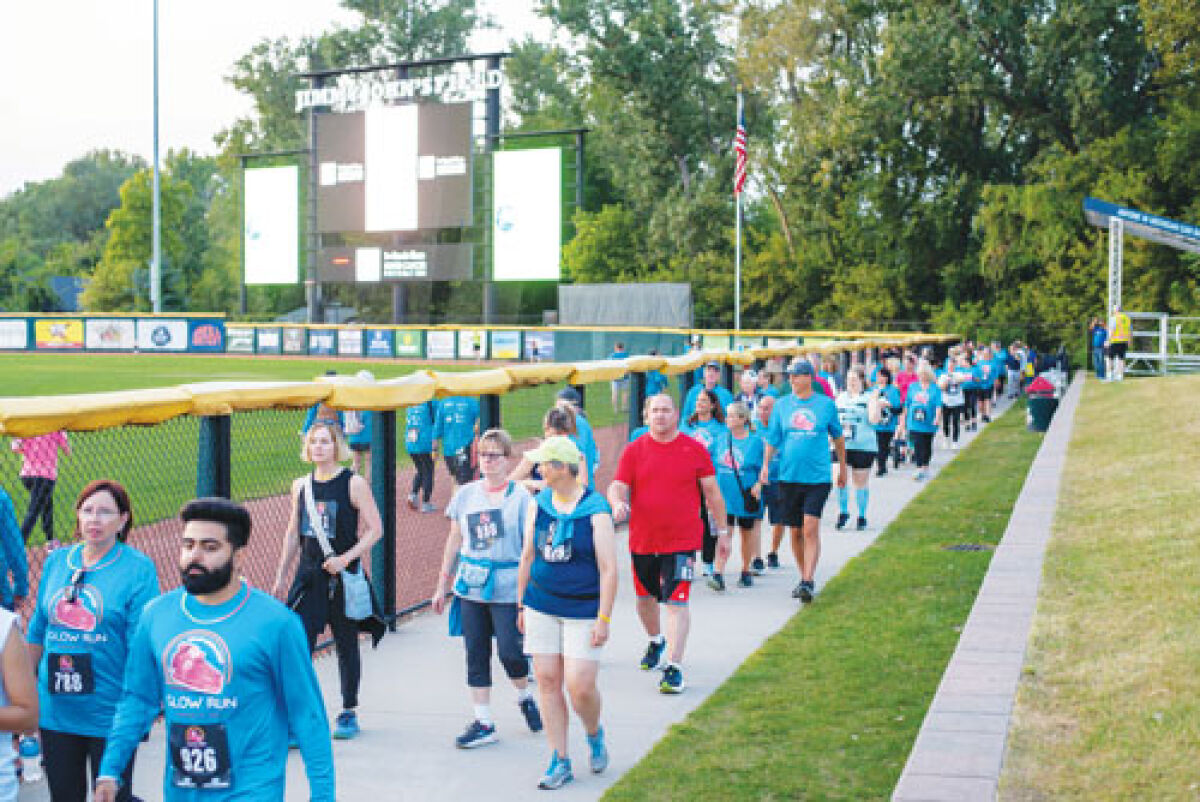  : A past Cassie Hines Shoes Cancer Foundation’s Glow Run sees community members participating in the 5K to further support the foundation’s efforts with supporting programming for young adults with cancer.  