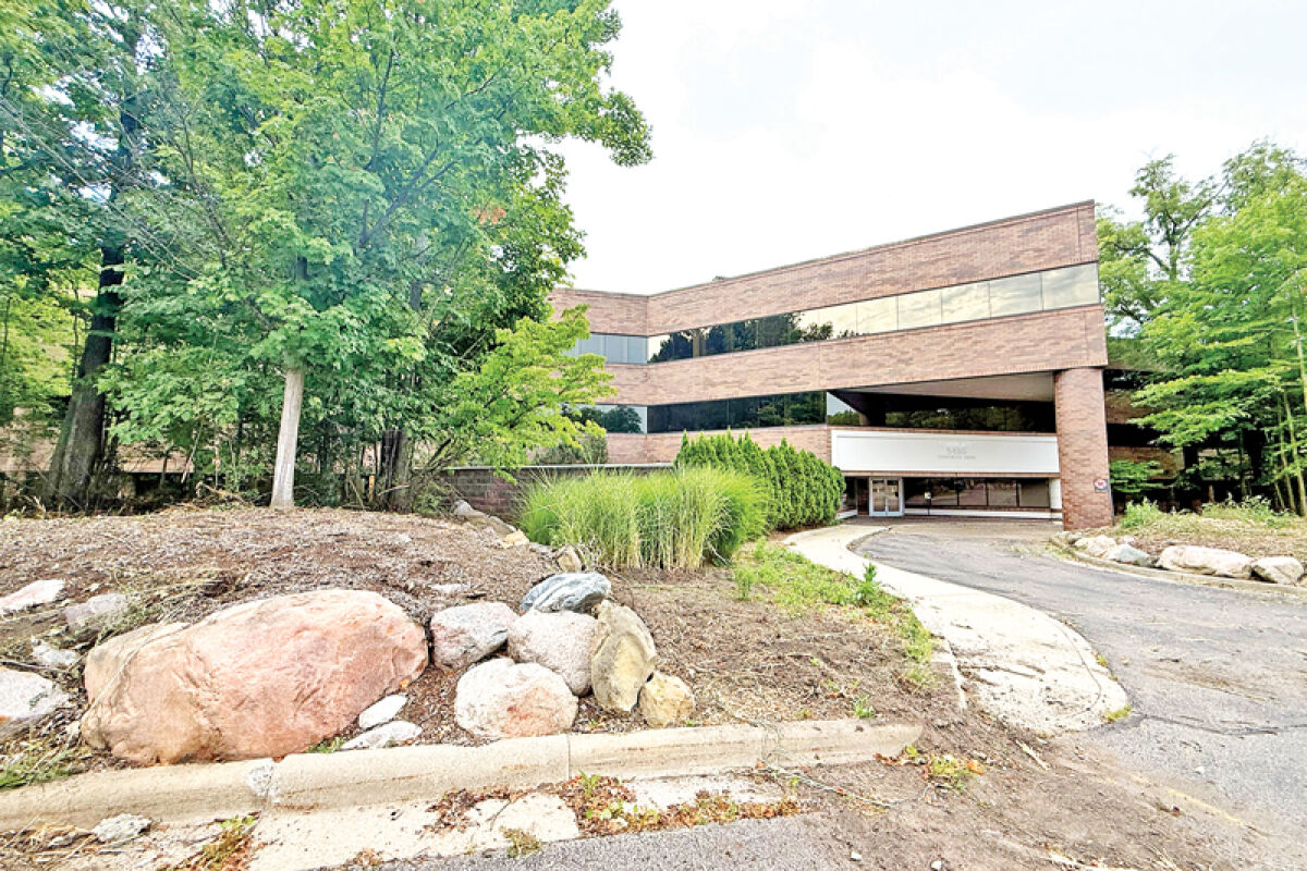  An underutilized three-story office space on Corporate Drive may soon be demolished in order to build 82 townhome units and a retail plaza. 