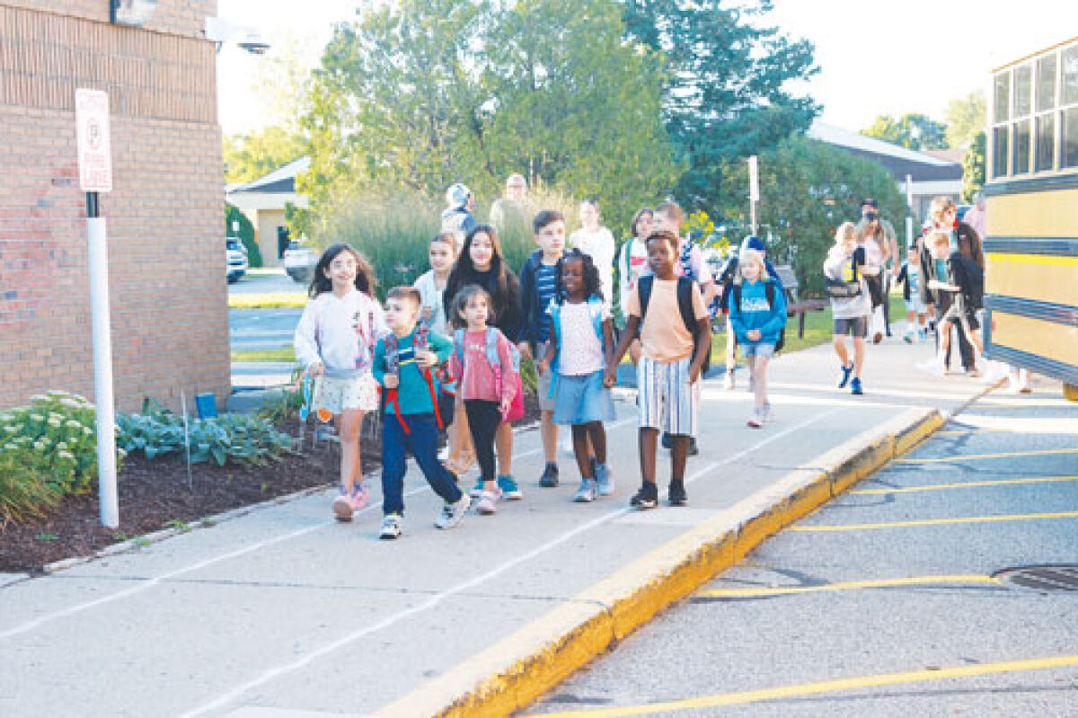  Students arrive for their first day of school at Morgan Elementary on Aug. 26.  