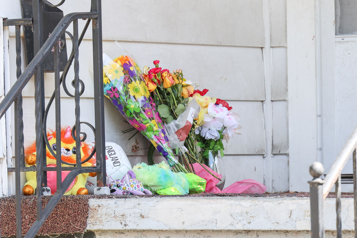  Flowers, a soccer ball and toys were placed on the porch of a home in the 23000 block of Berdeno Avenue in Hazel Park where police said a double homicide occurred over the Labor Day weekend. The victims were a mother and her 12-year-old child. A suspect is now in custody.  