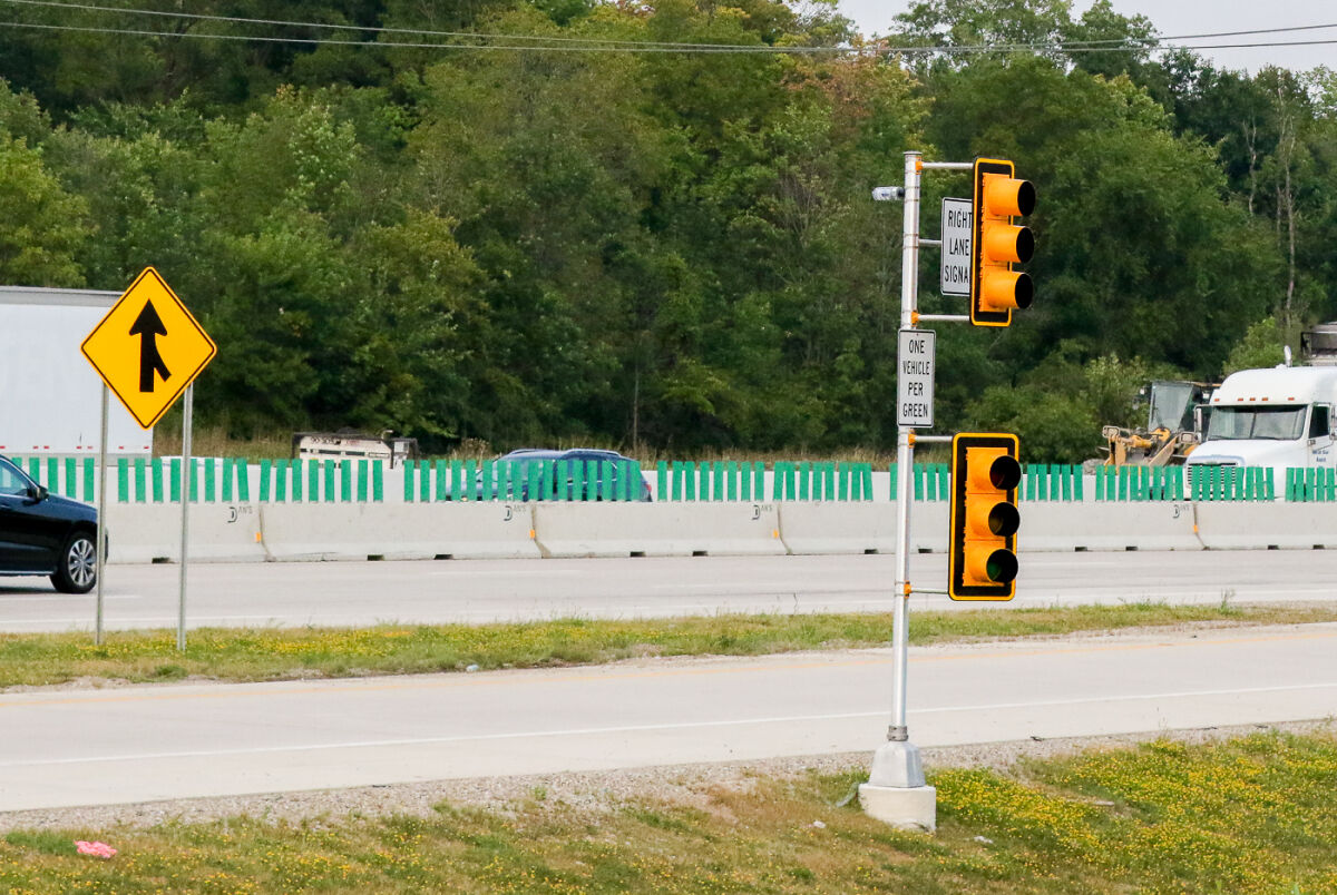  This photo from Aug. 30, 2024, shows a ramp meter along the Interstate 96 Flex Route in western Oakland County. All such meters are active as of Sept. 3, 2025, and will show drivers red and green signals under certain traffic conditions. 