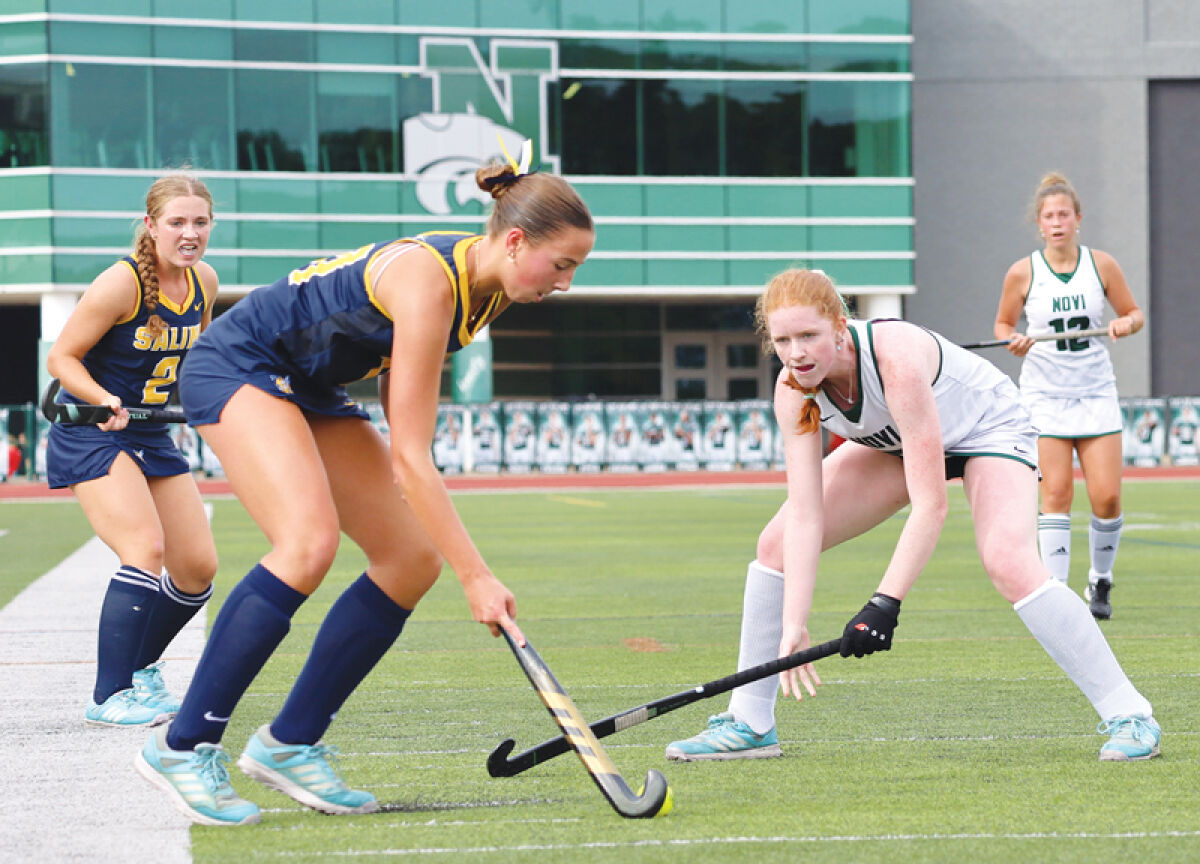  Novi’s girls field hockey team squares off against Saline at Novi High School. 