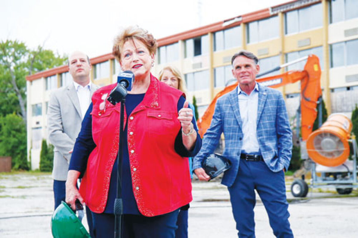  Barb Dempsey, a Mount Clemens city commissioner, speaks to assembled media with state and county officials ahead of the demolition of the Victory Inn motel on July 30, 2024. Dempsey will be ending a political career that began in 1989 after the Nov. 4 elections this year.  