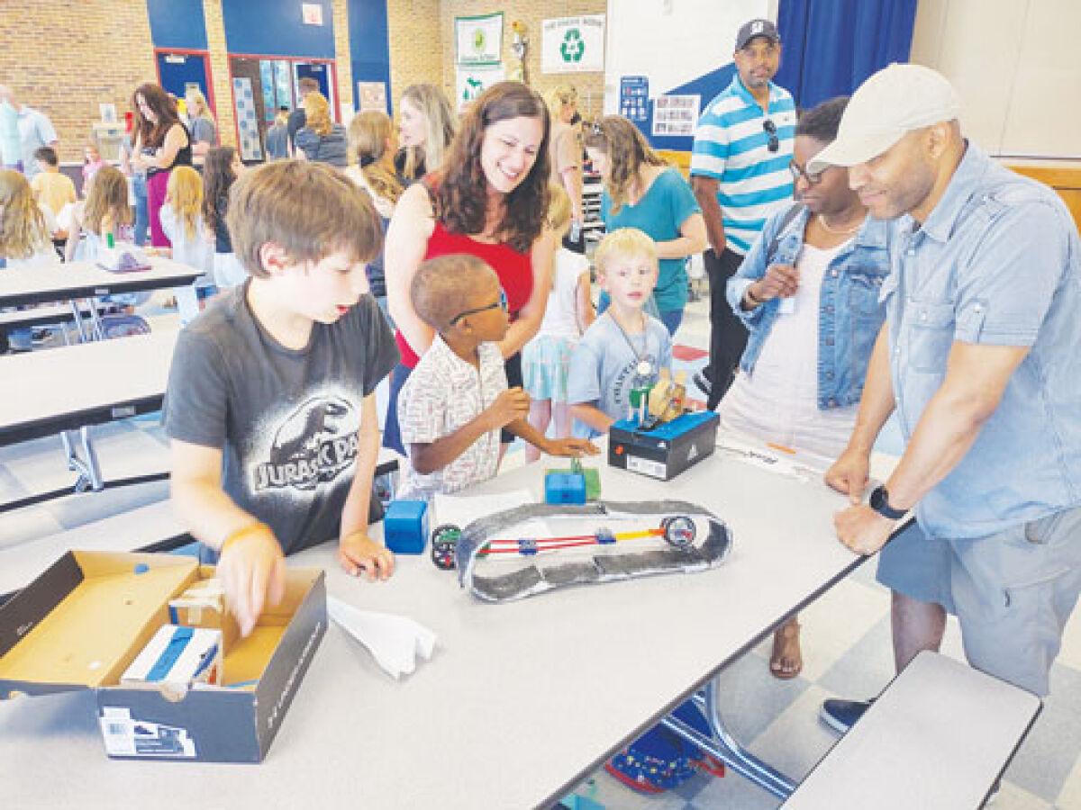  West Maple Elementary first and fourth graders design innovative prototypes aimed at combating water pollution using recycled materials.  