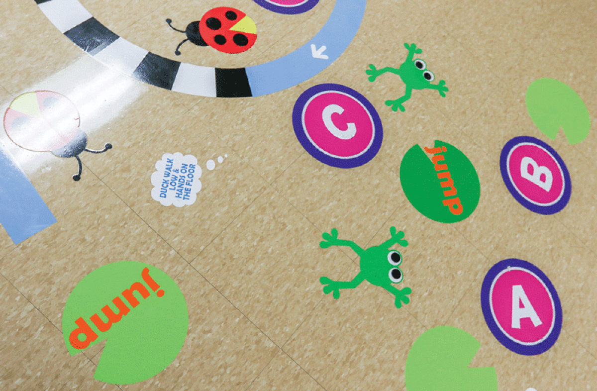  The indoor Sensory Path at Carlson Elementary School adheres to the school’s floor and exhibits a garden theme. The path was created by using research-based sensory integration therapy techniques to decrease what are described as sensory-seeking behaviors and increase cognition. 