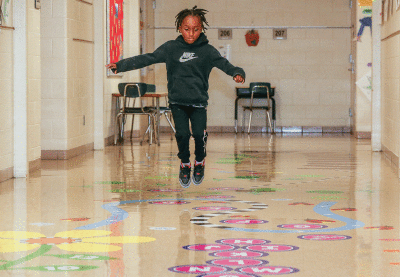  Carlson third grade student Davion Davis demonstrates how to use the Sensory Path.   