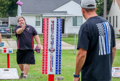  Rob Ritz, the Roseclair Eagles No. 2895 president, participates in the cornhole tournament Sept. 13. 