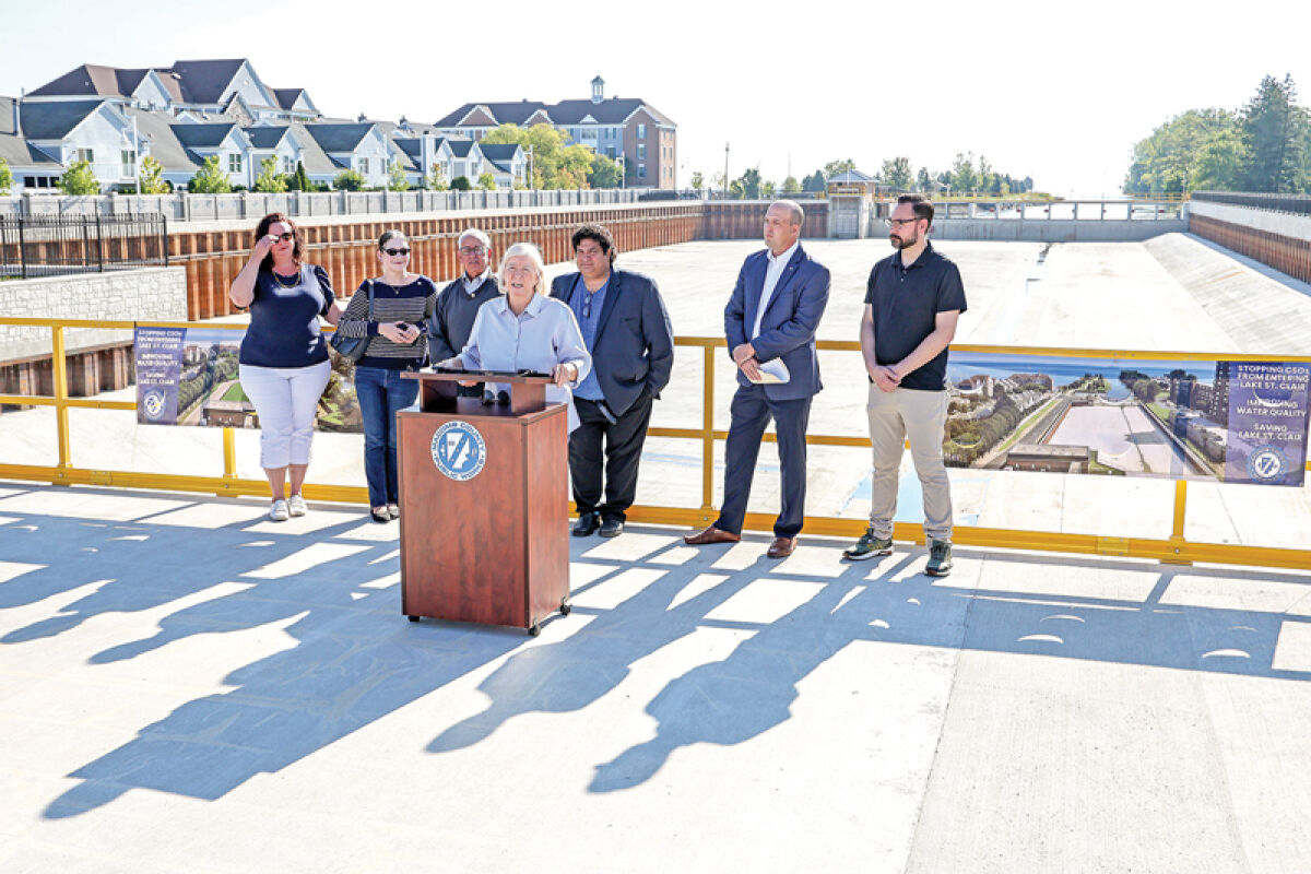  State and local officials gathered at the Chapaton Retention Basin for a press conference explaining the process of its construction and what it does for the lake. 