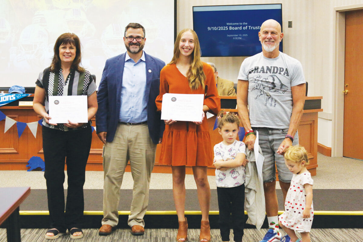  Top three winners of Macomb Township’s 2025 Summer Photo Contest pose with township supervisor Frank Viviano at the Sept. 10 township board meeting. Winners from left are Carol Muklewicz, first place; Morgan Pankiewicz, second place; and Albert Krakosky, third place. 