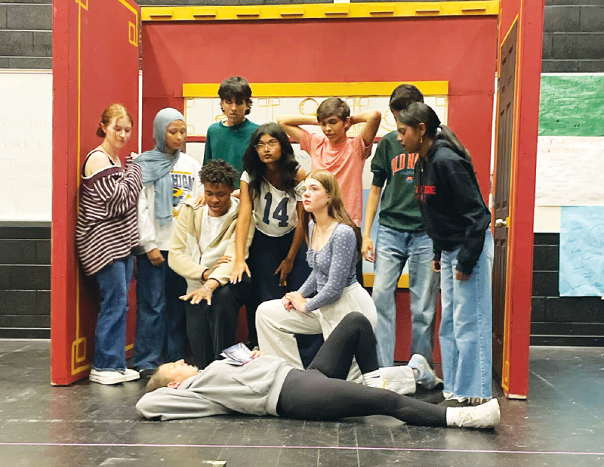  The cast of “Murder on the Orient Express” rehearses a scene in late September. Pictured from left are Allyson Bajorek, Jumana Mancy, Rachit Naik (kneeling), John Howland-Streng (standing), Joanna Ambadipudi, Ishaan Thurman, Nihar Joshi, Sruthika Jeyaranjan (kneeling), Lorelai Raudszus (lying on ground) and Ellyana Sharrow. 