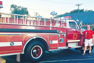  Doug Thompson, of Royal Oak, brought his red 1978 Ford F-700 Hahn pumper fire truck to Sandbaggers Sept. 17.  