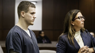  Tyler Fistler, left, stands at the podium next to his attorney, Mariell Lehman, during his sentencing on Thursday, Oct. 2, 2025, in the 16th Circuit Court in Mount Clemens. 