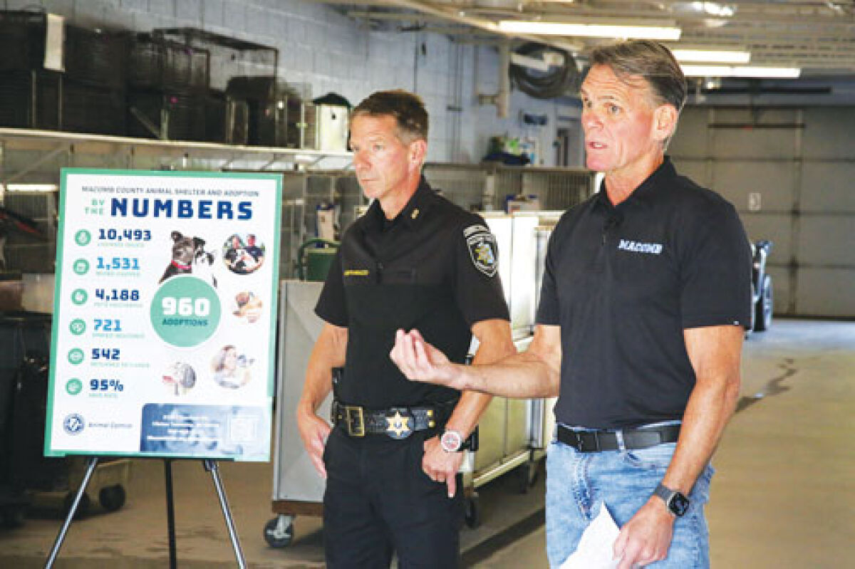  Macomb County Executive Mark Hackel, right, and Animal Control Director Jeff Randazzo discuss the state of Macomb County Animal Control on Oct. 2. 