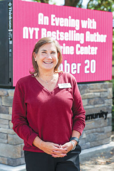  Kelley Siegrist, director of the Farmington Community Library, considers the digital sign to be one of her favorite recent accomplishments. 