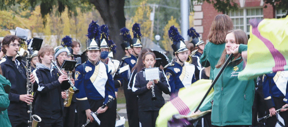  Grosse Pointe North and Grosse Pointe South’s bands perform at last year’s community tailgate.  