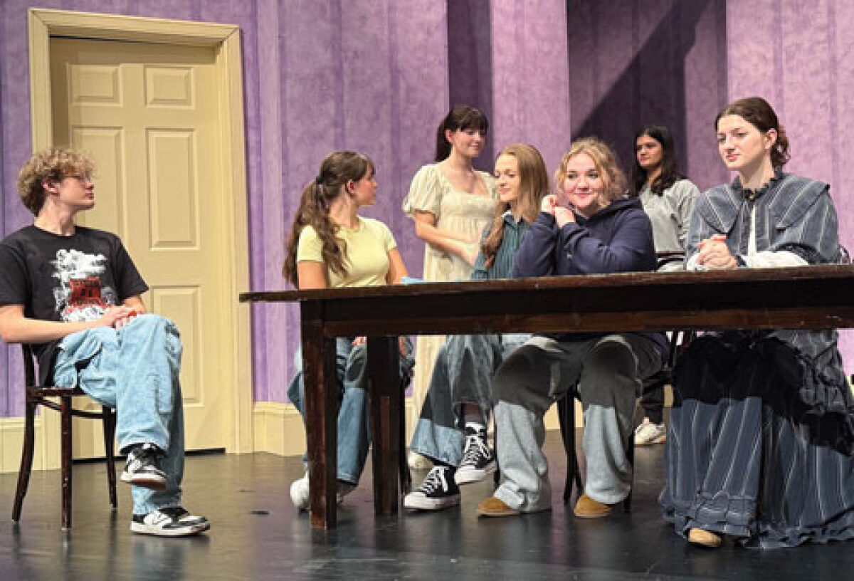 Grosse Pointe South High School students — some in partial costume — rehearse a scene from “Sense and Sensibility,” a theatrical adaptation of the Jane Austen novel. 