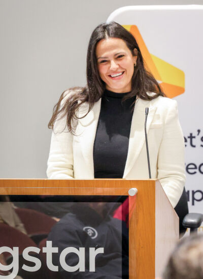  Suzanna Shkreli, commissioner of the Michigan Lottery, announces the amount of money raised. 