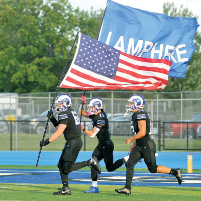  Madison Heights Lamphere takes the field in the team’s season opener against Ferndale this year. Lamphere won 17-14 in two overtimes. 