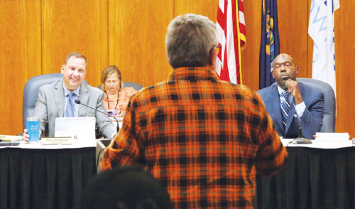  Bryant Goodreau, in orange flannel, speaks to the Clinton Township Board of Trustees about his appointment to the Prince Drewry Park Advisory Committee on Oct. 20. 