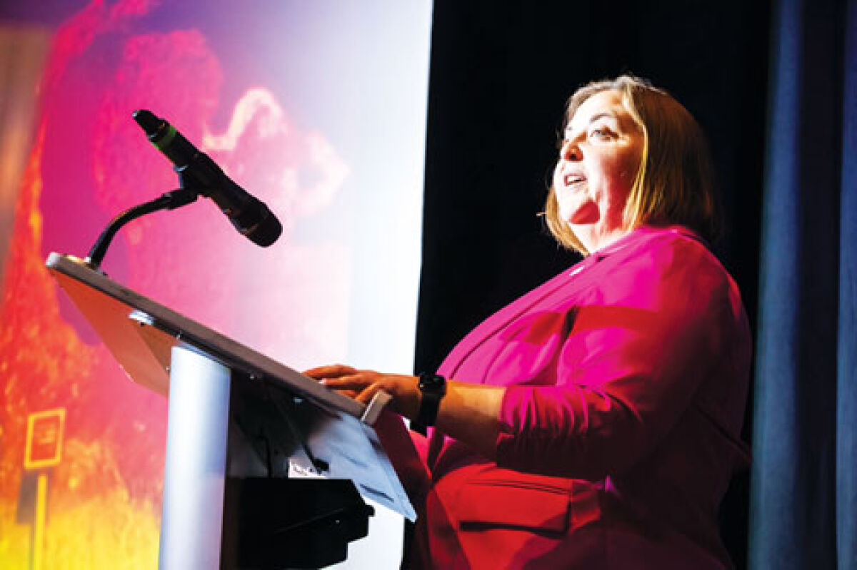  Warren Mayor Lori Stone addresses a crowd during the annual State of the City address Oct. 21 at the Warren Community Center. 