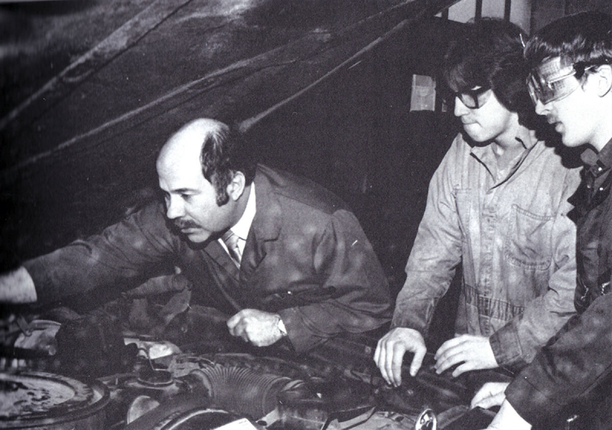  Paul Tregembo Sr., left, was an auto shop teacher at Roseville High School from 1969-2015. Seen here in 1985, he shared his knowledge of cars with his students and was known for his patience when teaching. 
