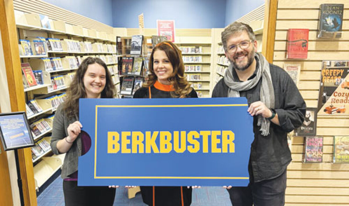 Youth librarian Rebecca Stout,librarian Lisabeth Conger and Library Director Matt Church present the new BerkBuster area at the Berkley Public Library. 