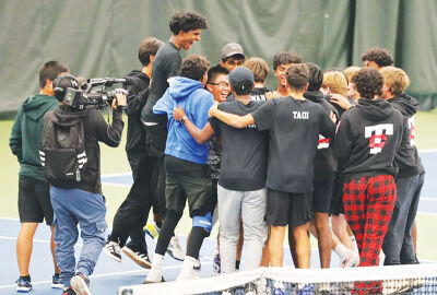 Troy High rushes the court after clinching the 2025 state title.