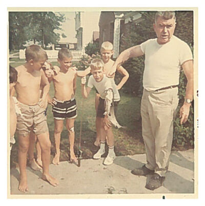  Neighborhood boys show off the catch of the day in this undated historical photo from Eagle Pointe on the Lake. 