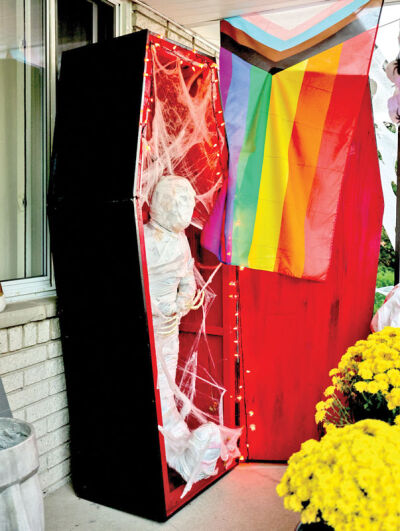  The Youngs have a mummy display on their front porch. The coffin has been in Kat’s family since she was a child, and the mummy is a mold of Braxton.  
