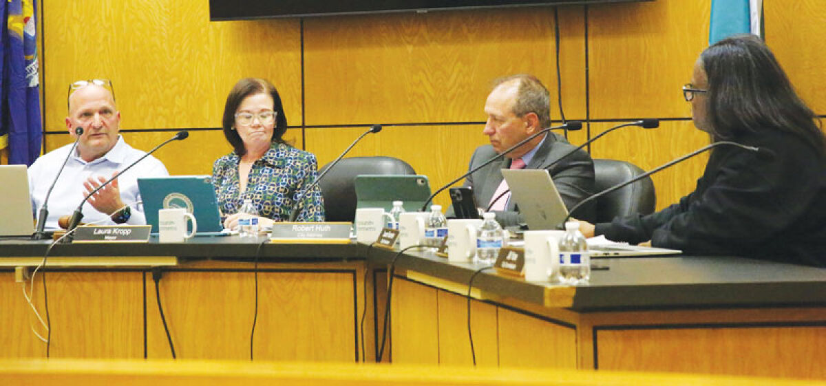  At the Oct. 20 Mount Clemens City Commission meeting, City Manager Gregg Shipman answers a question from Commissioner Theresa McGarity about an ordinance that would allow golf carts on some city streets. Commissioners approved the first reading of the ordinance. McGarity was the lone vote against it among attending commissioners. 