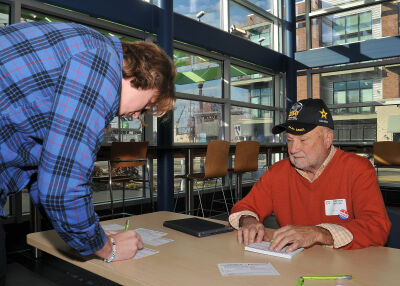  David Ulmer prepares to vote with the assistance of election worker Marc Reinerth at the Ferndale Area District Library Nov. 4. 